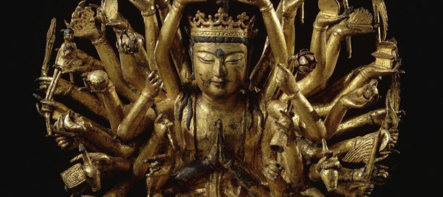 Image d'une sculpture en fonte de fer de Avalokiteshvara à mille bras