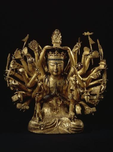 Image d'une sculpture en fonte de fer de Avalokiteshvara à mille bras