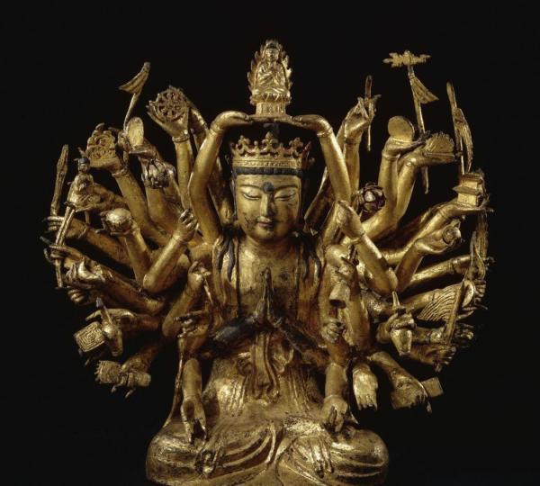 Image d'une sculpture en fonte de fer de Avalokiteshvara à mille bras