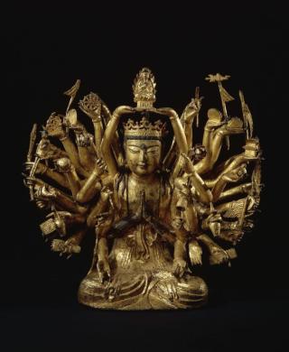 Image d'une sculpture en fonte de fer de Avalokiteshvara à mille bras