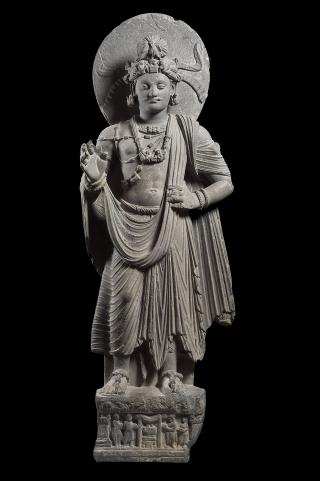 Photographie d'un bodhisattva debout