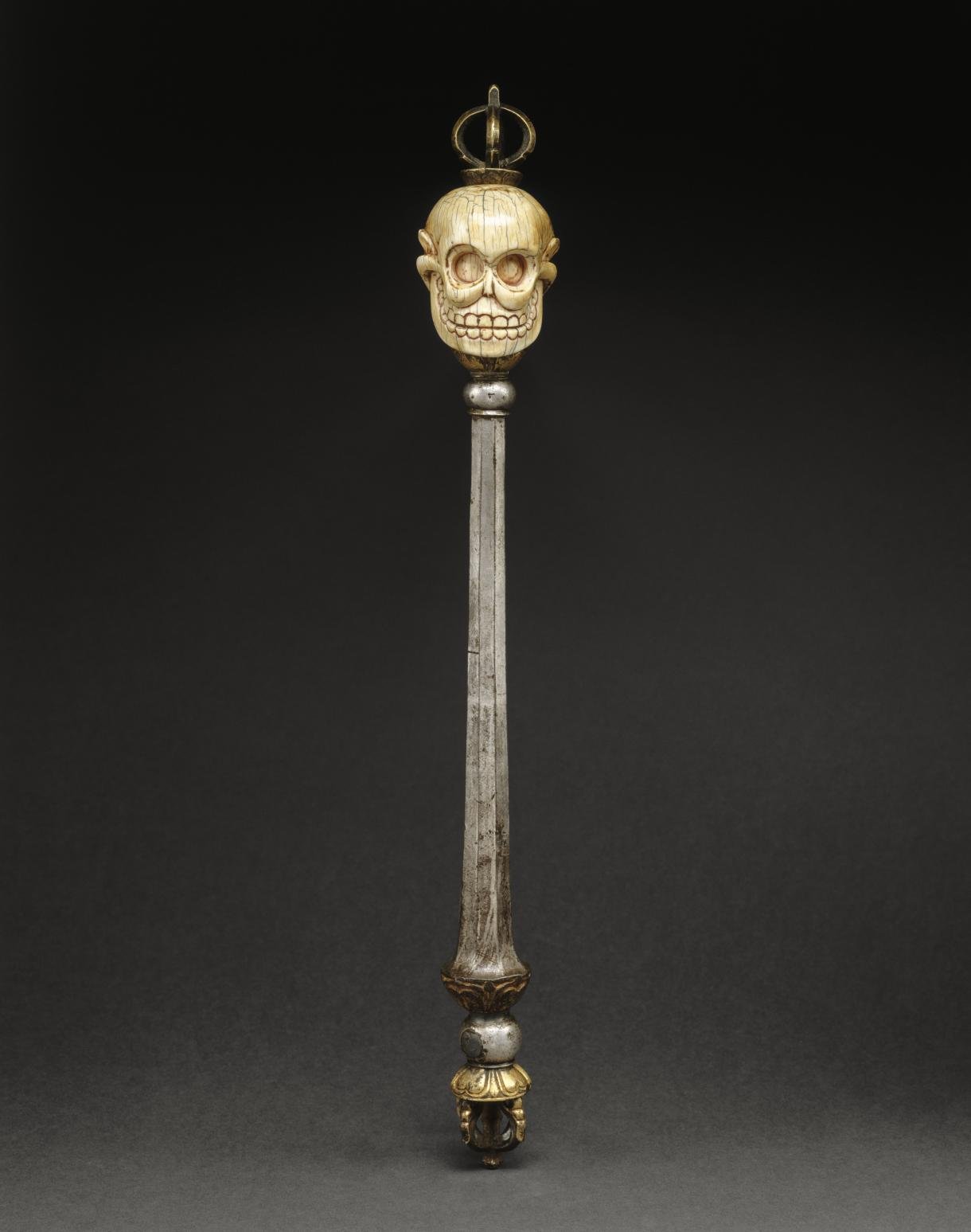 Bâton rituel à tête de mort