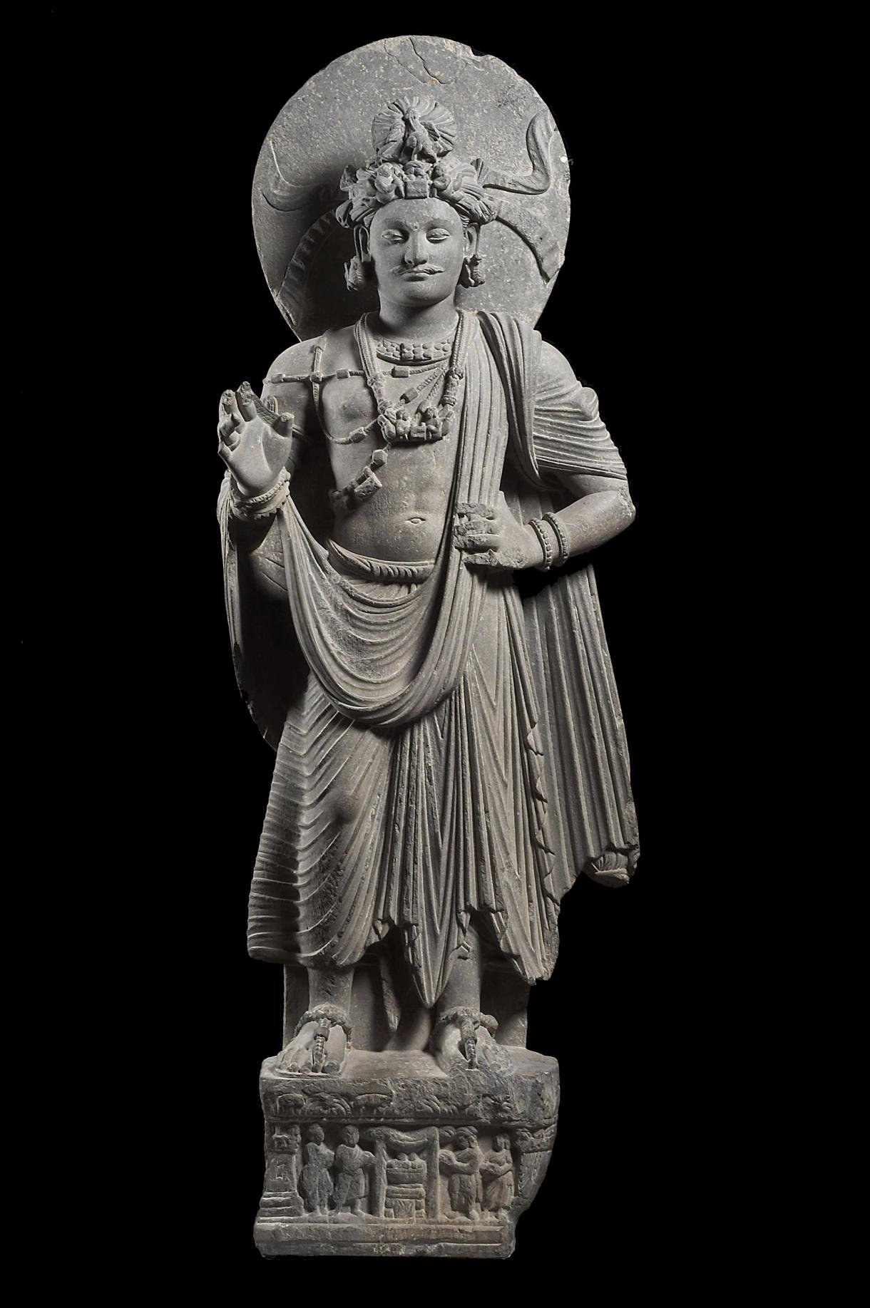 Photographie d'un bodhisattva debout